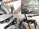 Swing arm, anodizing stripped and powder coated high gloss black.