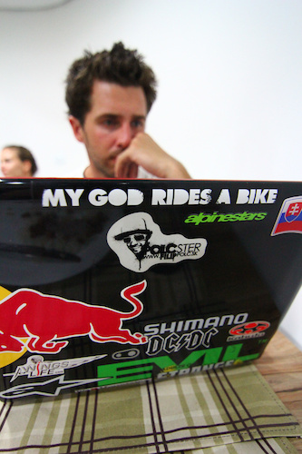 Polcster examining GoPro footage the night before race day.