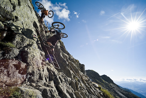 You dont get anything for free nowadays. Ladders are part of AM riding in the Alps. Photo by Dan Milner.