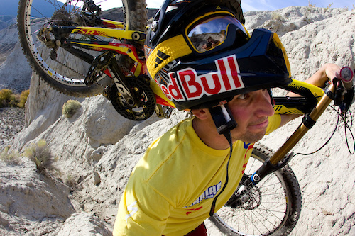 Darren Berrecloth hikes with his bike as the search for new and unridden lines continues