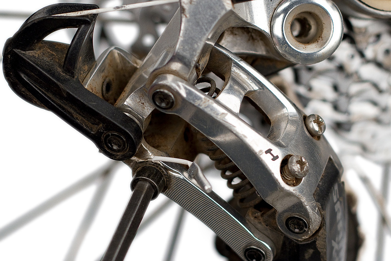 Re clamp the shift cable with the chain on the smallest cog