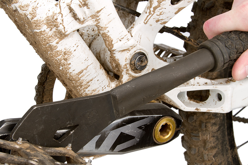 By aligning the crank and pedal wrench in this position you'll be able to use your body weight to help you break the pedal free