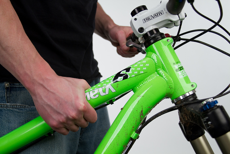 Hold the front wheel off the ground and check to be sure the steering turns freely
