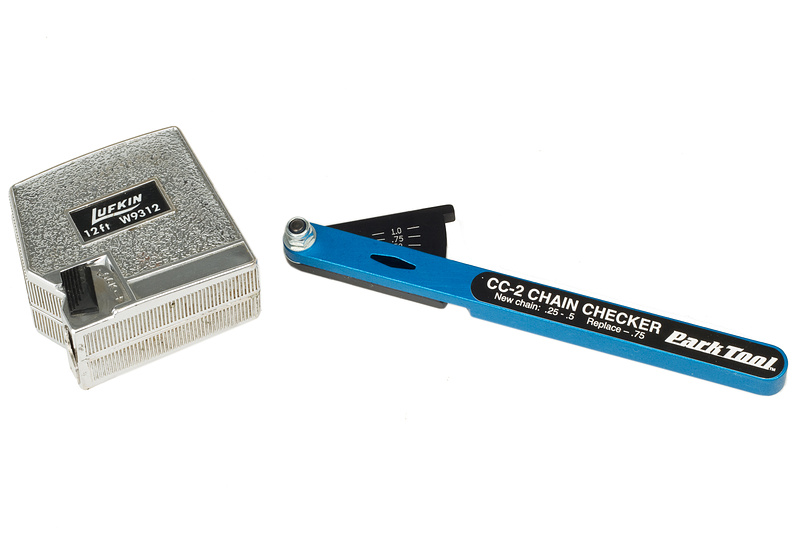 A Park CC-2 chain checker or a tape measure can be used