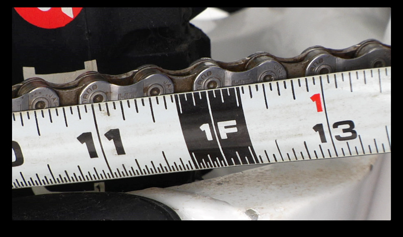 Step 2. Six complete links on a chain in good shape will measure in at 12