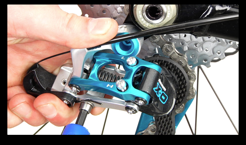 Step 1. Shift your rear derailleur to the smallest cog/hardest gear. Trim the old cable end off and use a 5 mm allen key to loosen the cable anchor bolt. Take note of where the cable is clamped (above or below the bolt) as this can greatly effect the shifting