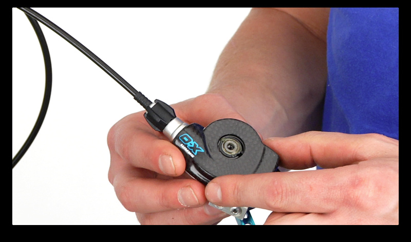 Step 3. Turn the dial counterclockwise to remove it, be sure to put it somewhere safe where it won't roll away. You can now remove the shift cover to access the shift cable within the shifter