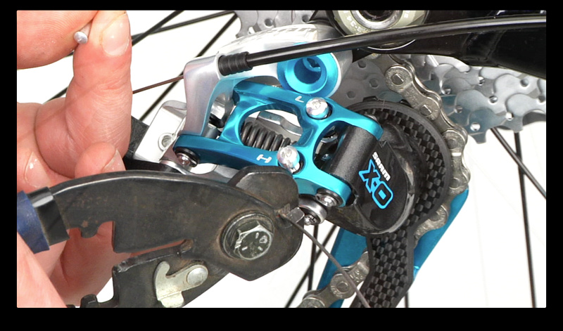 Step 11. Use your cable cutters to trim the new cable, leaving about an inch of extra cable. Crimp on your new cable end