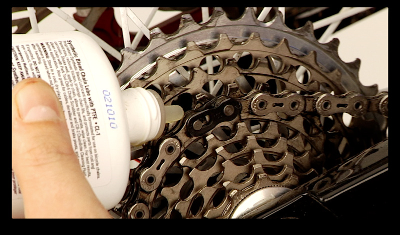 Step 3. Apply lube sparingly to each roller on both the top and bottom sides of the chain while pedaling in reverse