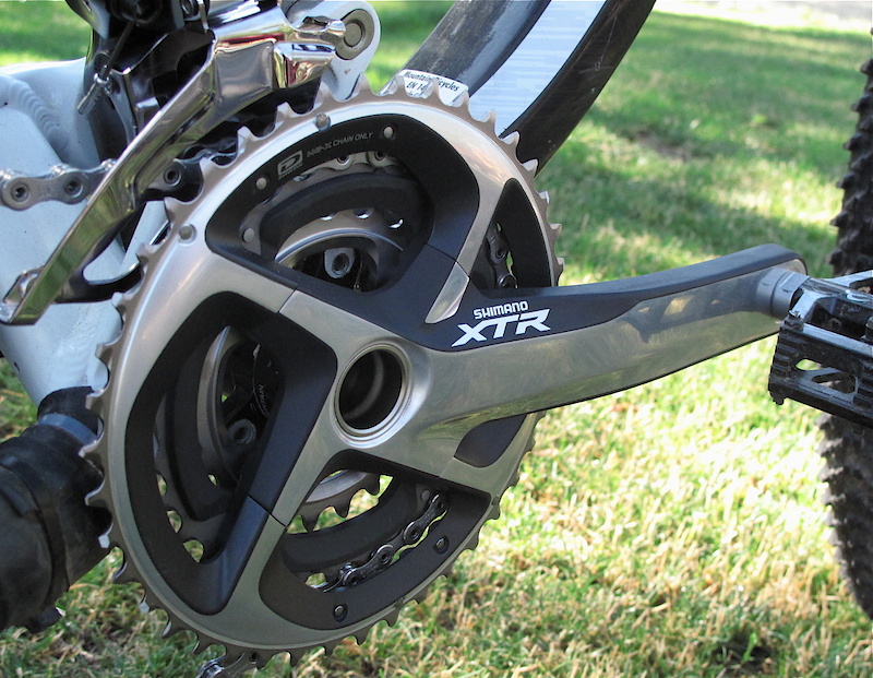 The 2011 XTR Trail crankset uses what Shimano calls CloseStep gearing - 42, 32, and a 24 tooth small ring. When teamed up with the new 11-36 XTR cassette it provides an easier low range (56.6