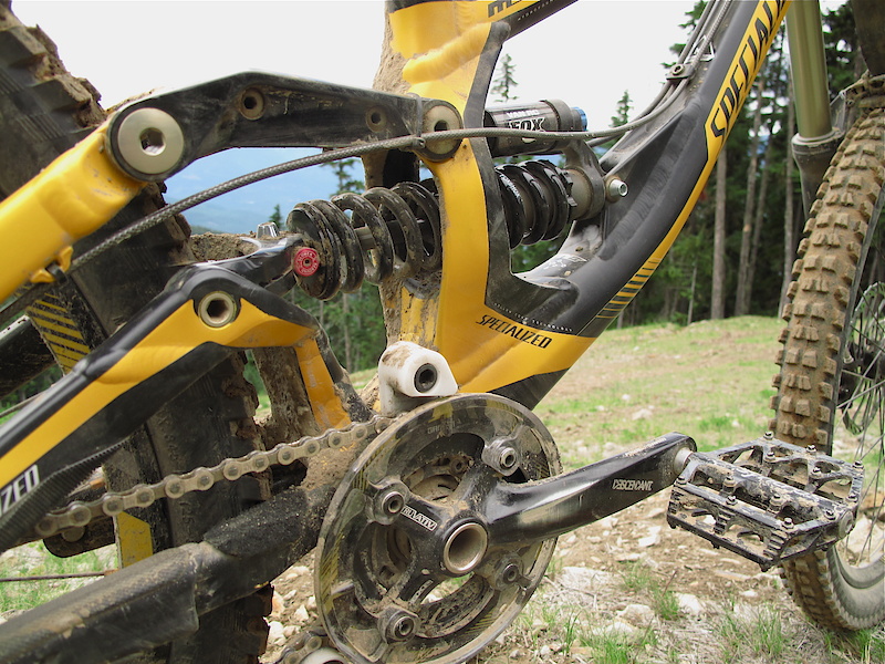 The new Demo has many refinements that set it apart from last years model, one of the biggest being a lower center of gravity. If you compare the previous model to this new 2011 version you'd discover that the shock is sitting lower in the frame and working with the uber low BB height to bring the COG down as much as possible. After two days of shredding this very bike in the Whistler bike park I have to admit that the new Demo is one of the easiest cornering bikes that I've ever been on once the speeds pick up. If you feel that the BB is too low for you, you can rotate an insert within the shock eyelet to raise it slightly. Listen to the audio below for the lowdown.