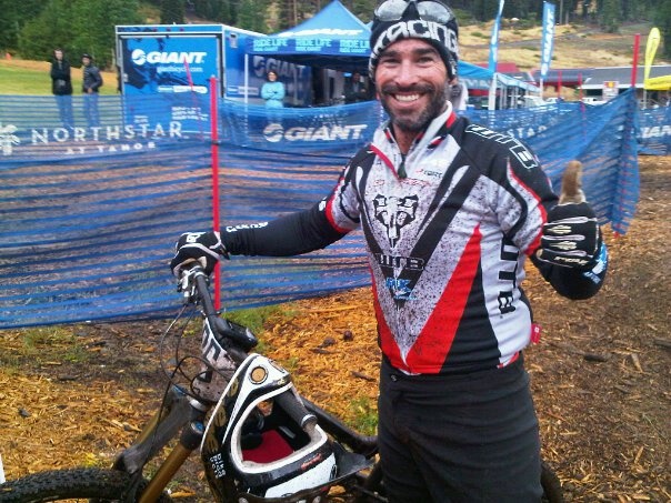 Mark Weir looking pretty happy after crossing the finish line of the 2010 Mega DH !