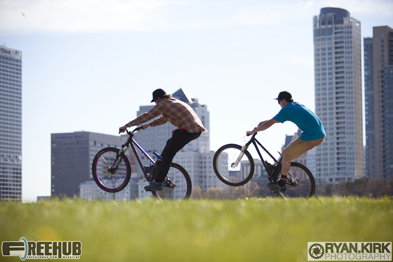 Pop-a-wheely is what we're all about! Riders Jon DANGERmeier and Brandon Watts in Milwaukee.