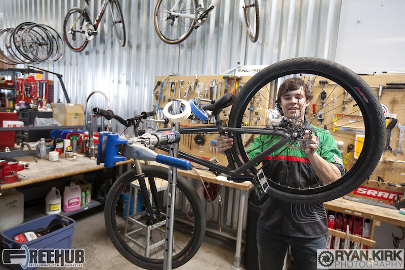 Cully Radvillas getting his bike ready as he talks with us about his work at SRAM.
