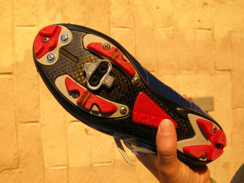 Draw a level line across the pedal using your mark line up the cleat and screw it down snugly don t tighten it completely yet I drew in a second line below the original - if you ride technical sections or jump a lot some riders like to set the cleat back 5 millimeters to add stability to the foot.