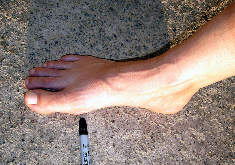 The pen is pointing at the ball of the foot. You ll need to find this spot when the shoe is on.