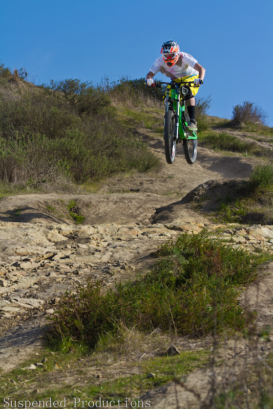 Yes that is Dan Danyul The Photographer and yes he is riding a Downhill bike