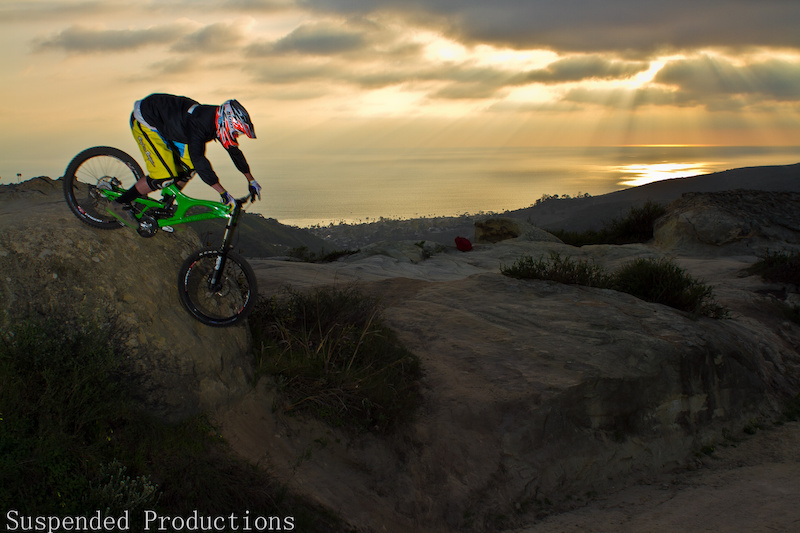 Yes that is Dan Danyul The Photographer and yes he is riding a Downhill bike
