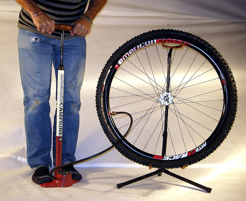Topping off the tubeless tire.