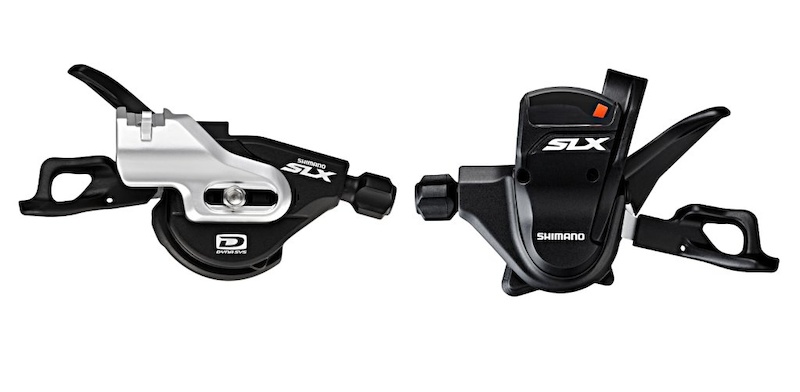 SLX shift levers have been reprofiled and the mech upgraded with the two-by three-by mode-change switch that was once exclusive to XTR and XT. The left shifter is the ISPEC integrated clamp design while the right features the optional indicator and standard handlebar clamp mount.