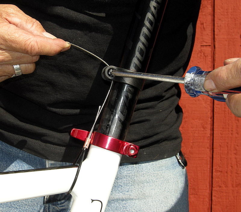 You may have to loosen the seatpost collar to thread the cable through.