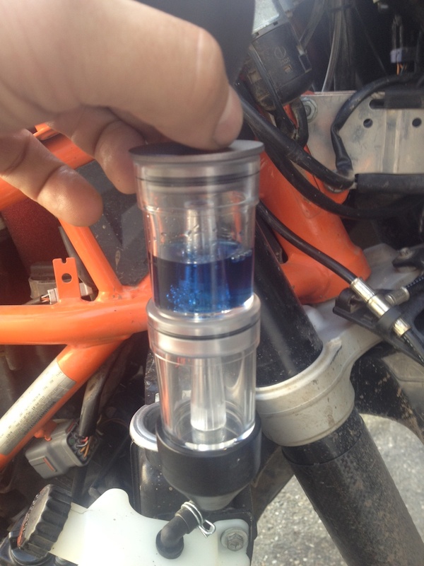 dirty oil and dirty coolant after water pump change Adventure Rider