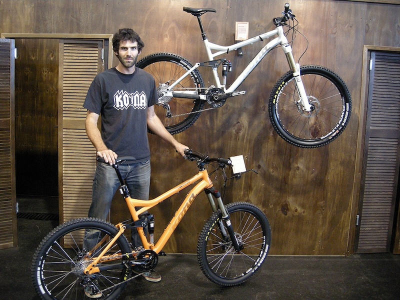 Designer Chris Mandell stands beside the Kona Process DL 2013 top and the Process