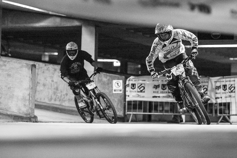 Head to head action DH Vs Hardtail during Evans Cycles Urban Dual at NCP Multstory Car Park Cardiff Wales United Kingdom. 28October 2012 Photo Charles Robertson
