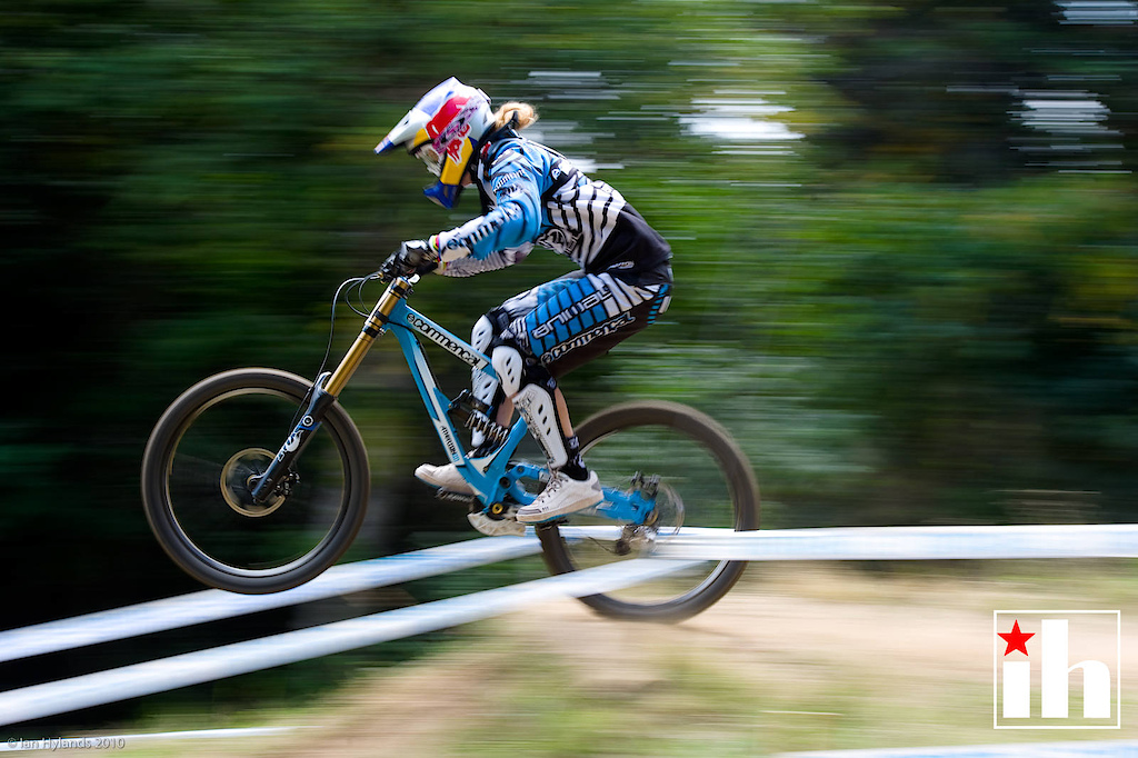Rachel Atherton, in this 1/50th pan blur Rachel and most of her bike is fairly solid, background blurred. It looks fast.