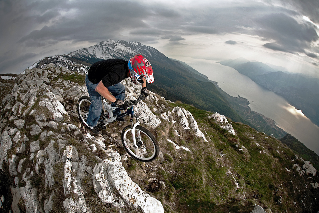Lake Garda s local Freerider Hutch Olivieri riding the steep slope that goes on the Lake. one of the shot that I like more on my local trails.