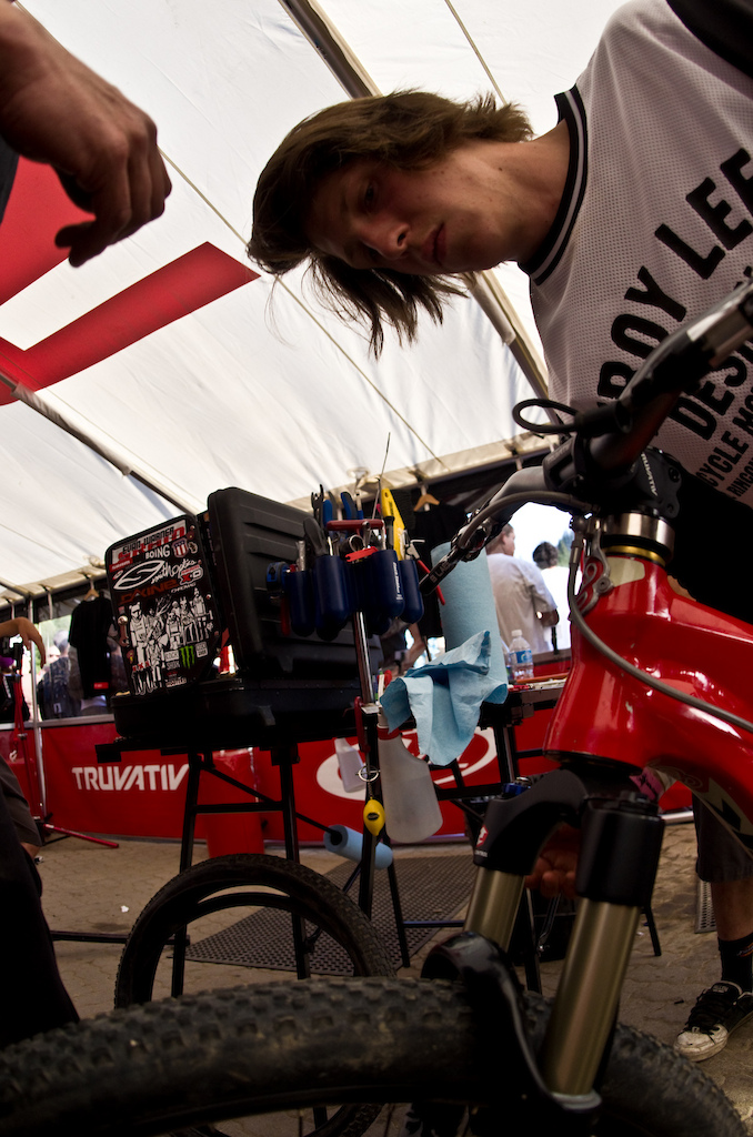 Precision and attention to detail gets Semenuk to the top. He was back in the park on the Sunday after winning Crankworx practicing and training to win again. Most people would star fish and nurse the hang over but not this one. Here he takes a couple of seconds to work with Shawn on set up.