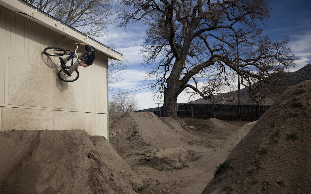 Zink wasted no time in running right through the trails. Second lap wall slap.