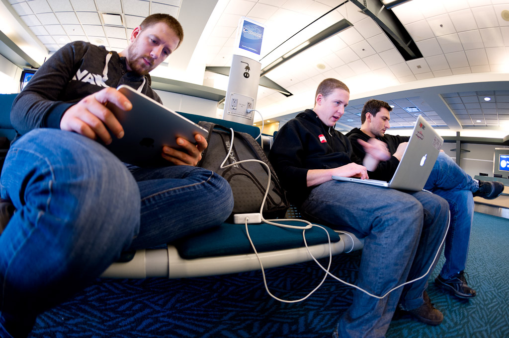 Larock Levy and Karl non-stop workaholics 7 30 AM at the airport...