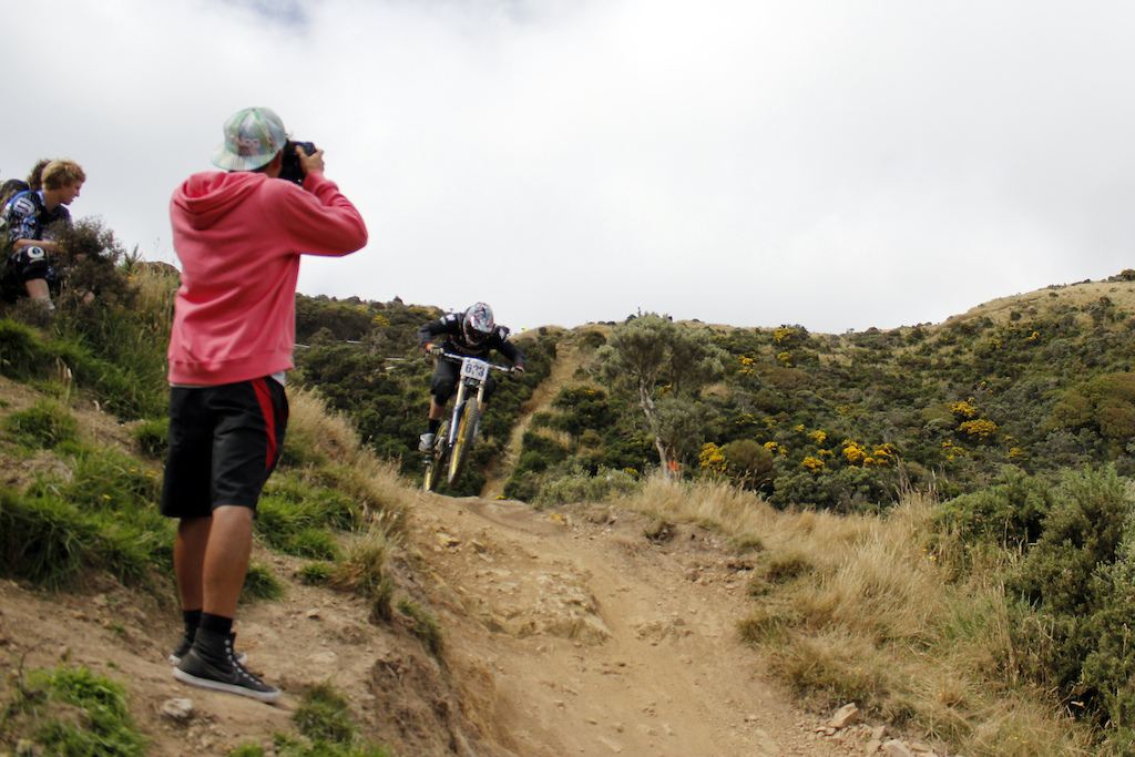 NZ Downhill Nationals 2012, Long Gully Wellington
 Edited versions of pics I thought were cool. Only cropping/colour/level editing.
 If anyone wants me to look up pics of you, gimme a race number and a description of your kit/bike and I can see what I got for ya.
Also, tag yourself or your mates here:
http://www.facebook.com/media/set/?set=a.276141442458480.64837.100001878781864&amp;type=1