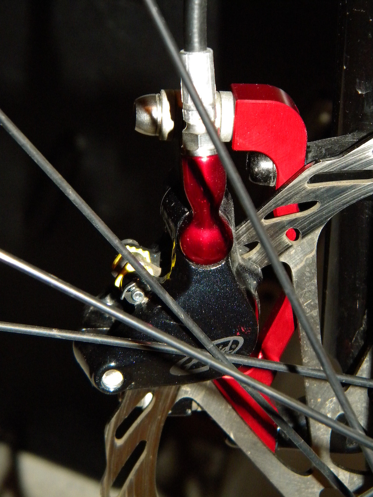 New red anodized NSB brake mount adaptor install on my Stumpy - rear view.
Another excellent Canadian product.
