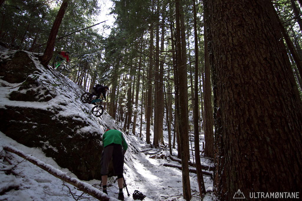 Ross filming Dan leading in Connor on a snowy steep.