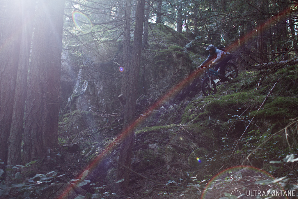 This is like a down flat down flat down rail... but single track for bikes and on a rock.