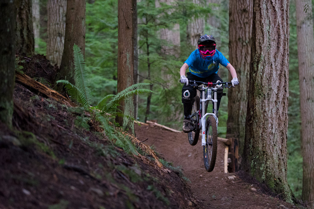 Holly Feniak rides her bicycle on the sunshine coast of BC