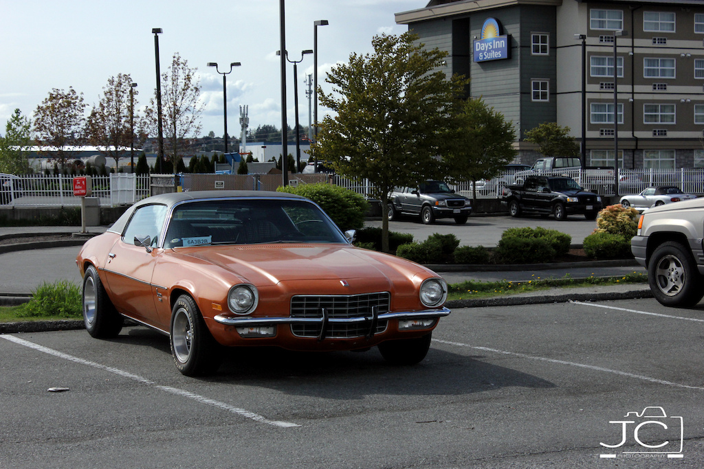 1973 number's matching, medium orange, all original, California blue-plate Camaro with 43,000 original miles on it.