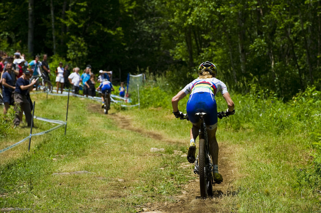 It a team until the flag drops. Then it s all out war. Catharine Pendrel launching the effort to bridge up to the faltering Gould on the final lap of the race. It may not look impressive but the wattage this lady was throwing down on the climb here was impressive you d have needed a motor to catch her once them legs started spinning.