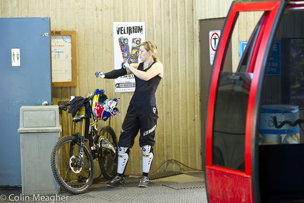 Let s get it on Rachel Atherton suiting up for battle... It s been hot and humid here in Quebec--when it hasn t been pissing rain--and riding up to the start shack in a gondola that basically amounts to a glorified sauna means that Rachel delays donning the all black GT team kit until the start of her first practice run.