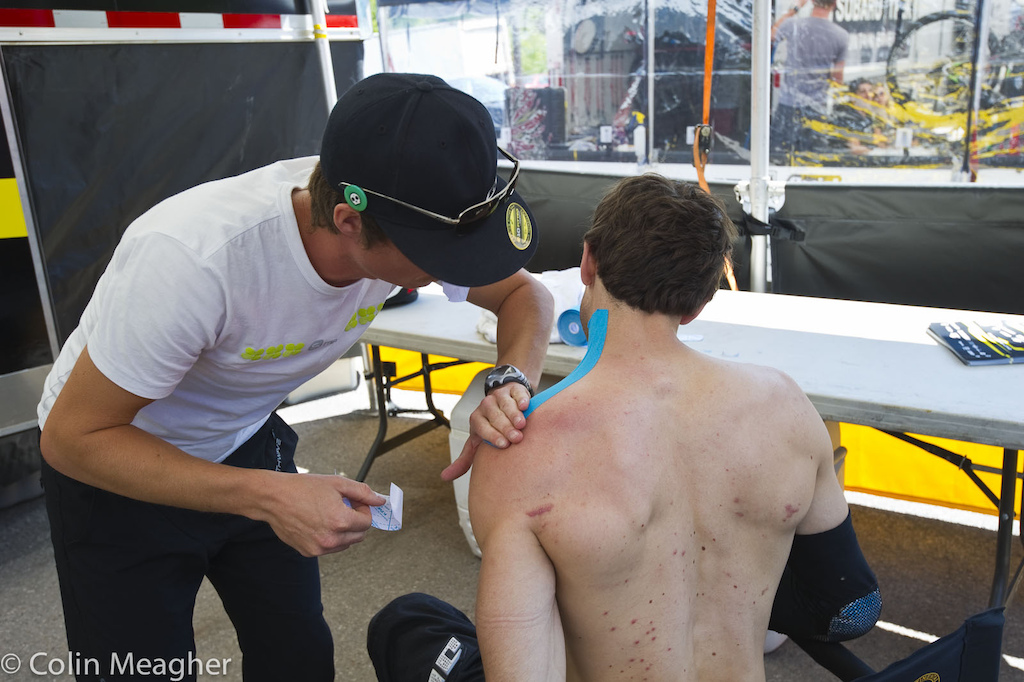 Rag-dolling down the slopes of Mt St Anne has repurcussions. Gee-Man getting a bit of a tape job on his trapezoid muscles prior to practice. I can still feel it. That was a HARD crash.