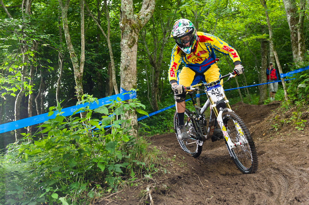 Kevin Aiello taking some turns through the trees.