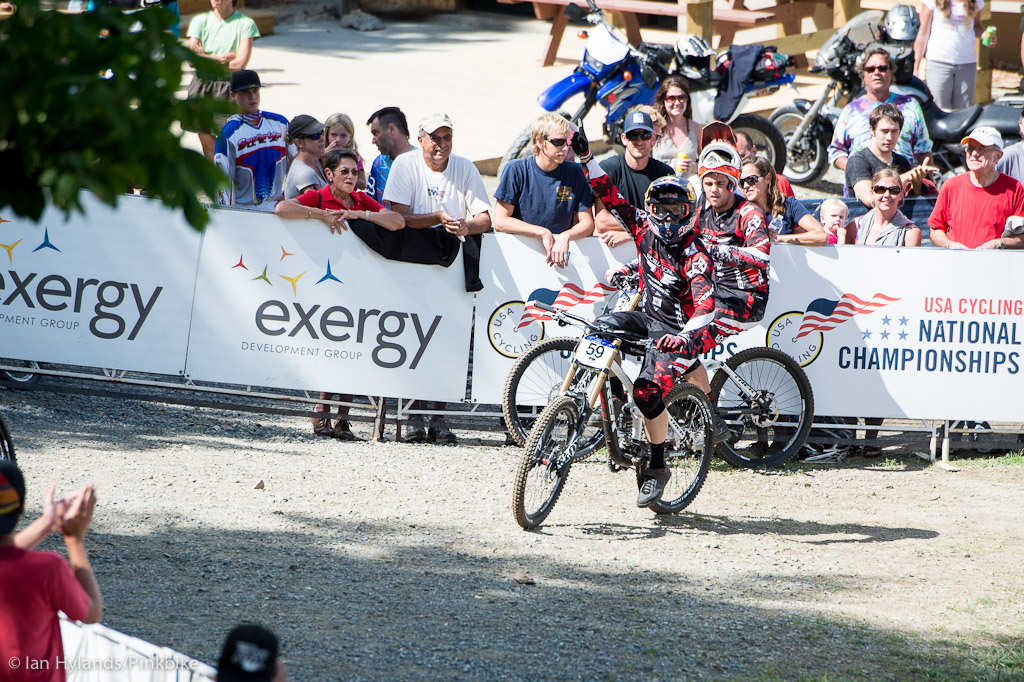Aaron Gwin celebrates after seeing his time.