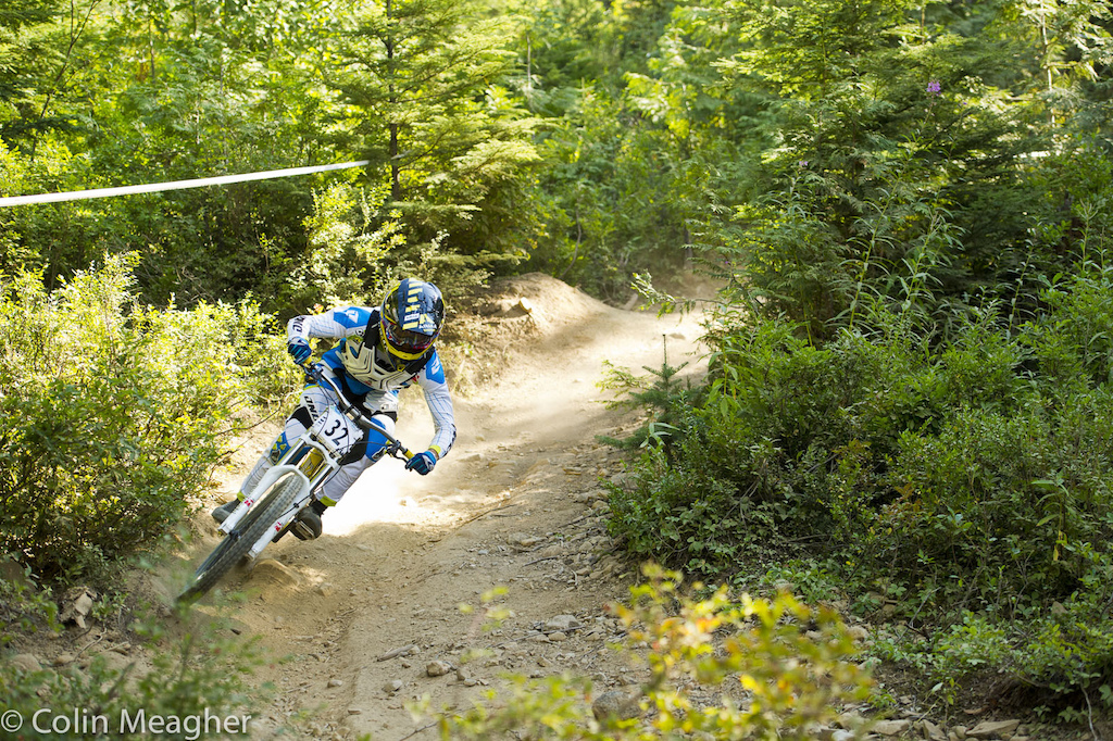 Austin Warren slamming a crusty dusty corner below the first road gap on the Open Track.
