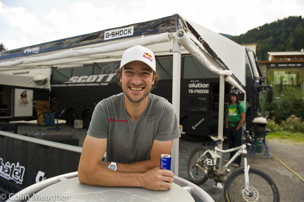 Not a man to be taken lightly... Claudio Calouri the Scott 11 team manager runs the team has a trail building company and competes in the Redbull Crashed Iced competitions. Oh and when he s down to only two riders representing his team and the sponsors at World Champs he goes to the Swiss Nationals races places high enough to make the Swiss Team selection and pins on a number. Hell yeah