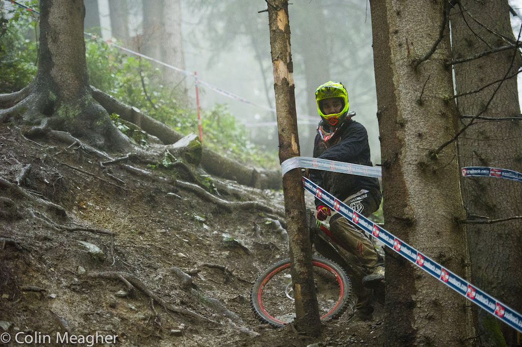 Scouting for sniper lines in the rain... Sam Hill was the last rider down the hill today.