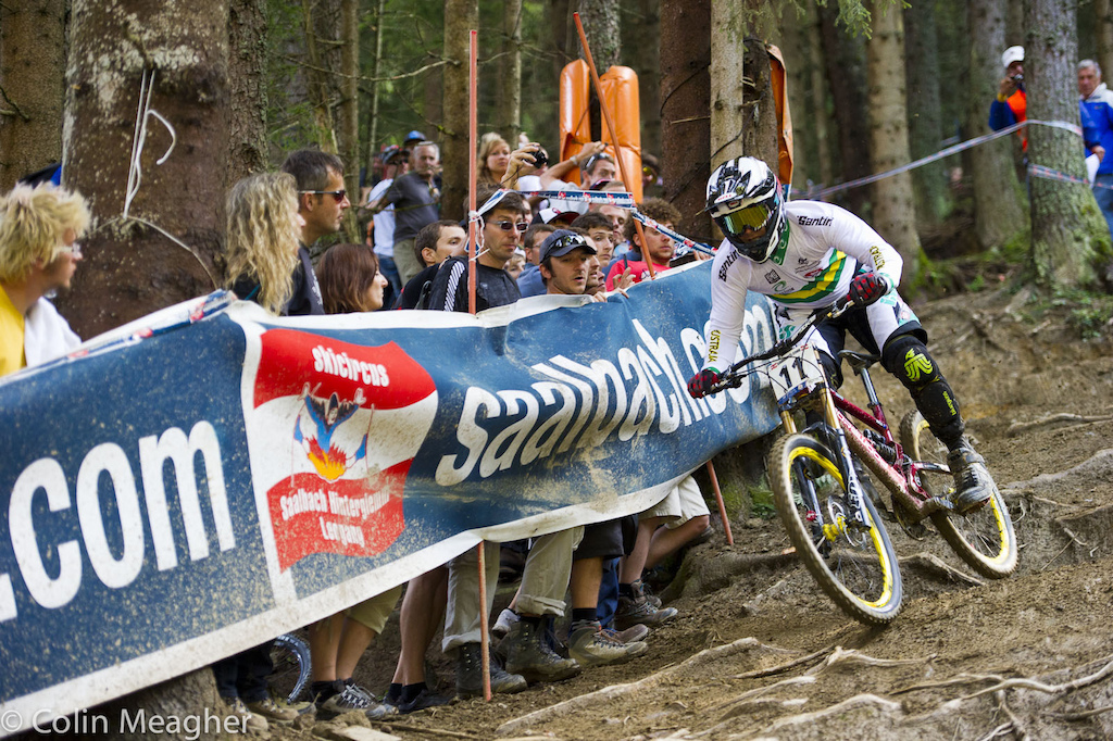 Mick Hannah hugging the fence in the final woods section of the track 