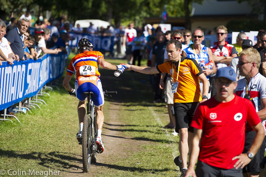 Rudi Van Houts taking a feed. It was bloody damn hot on the track for a September day in the mountains 28C...