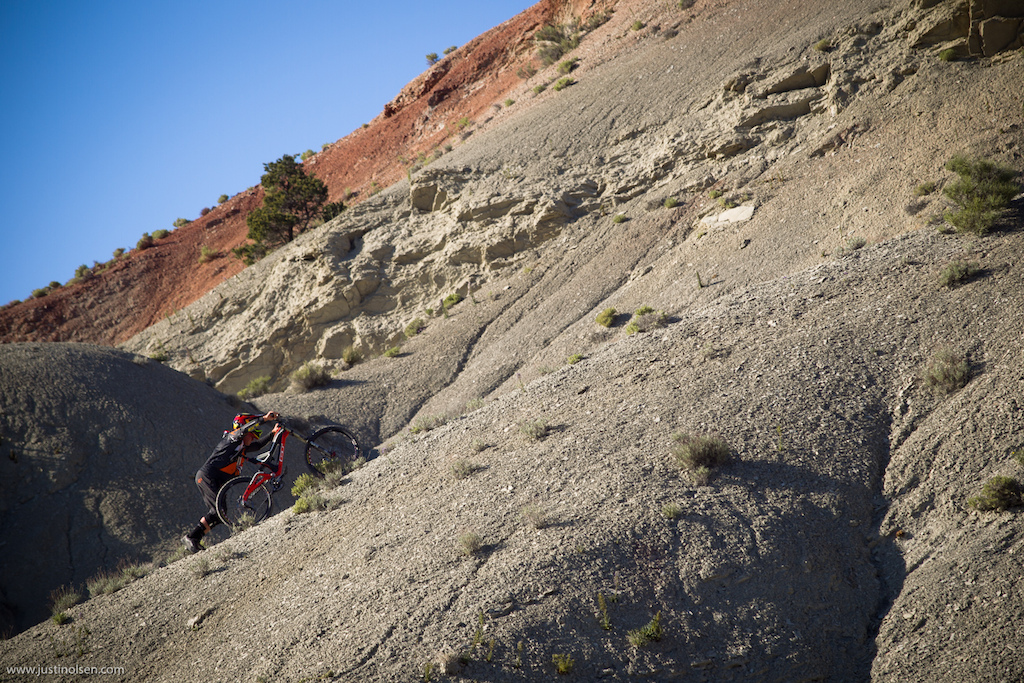 It isn t always helicopters following helicopters... Kyle Strait spent what seemed like 2 hours pushing his bike to the top of this remote Utah line.